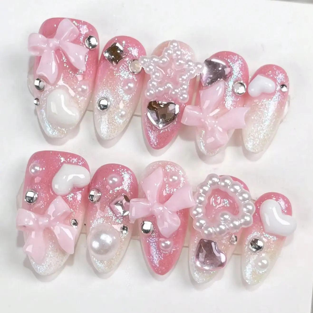 Peach Pink Gradient Rhinestone Bowknot Press-On Nails, 10-Piece Set, Transitioning from Peach Pink to Milky White from Top to Bottom, with Fine Shimmering Aurora Silver Powder Covering the Nail Surface, a Shimmering Jelly-Lik