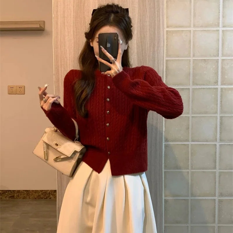 100% pure wool autumn fragrance New Year's red knit cardigan women's twist sweater with high sense of laziness short top.